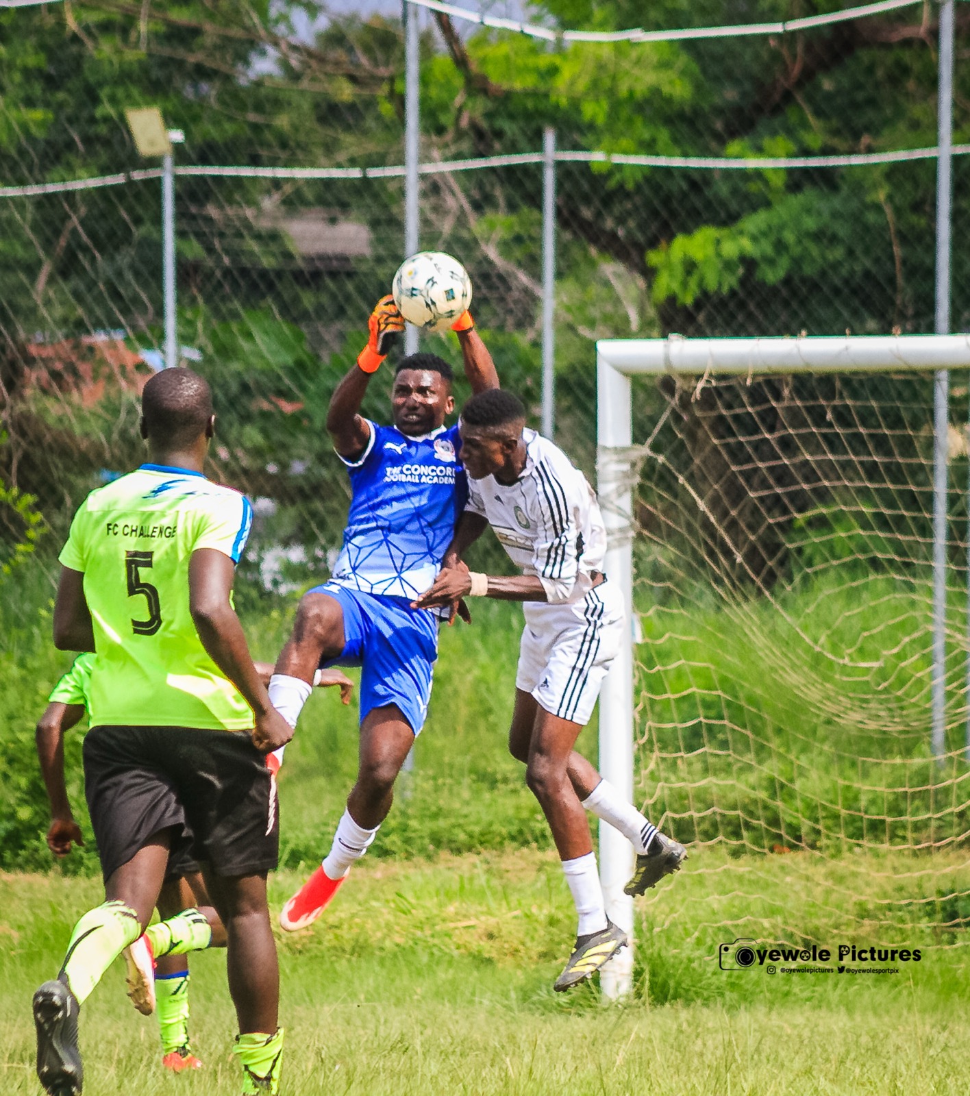 Coach Akindeko making a match save